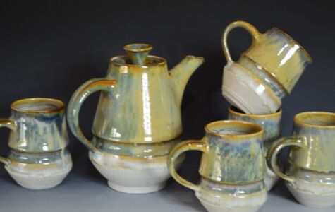 Tea Pot & 4 Cups, $165