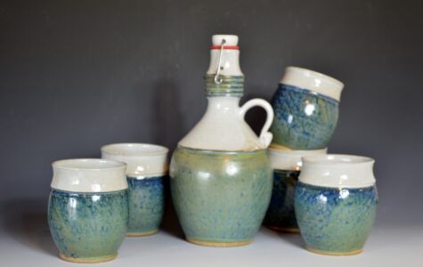 Growler and set of 4 Mugs - $125